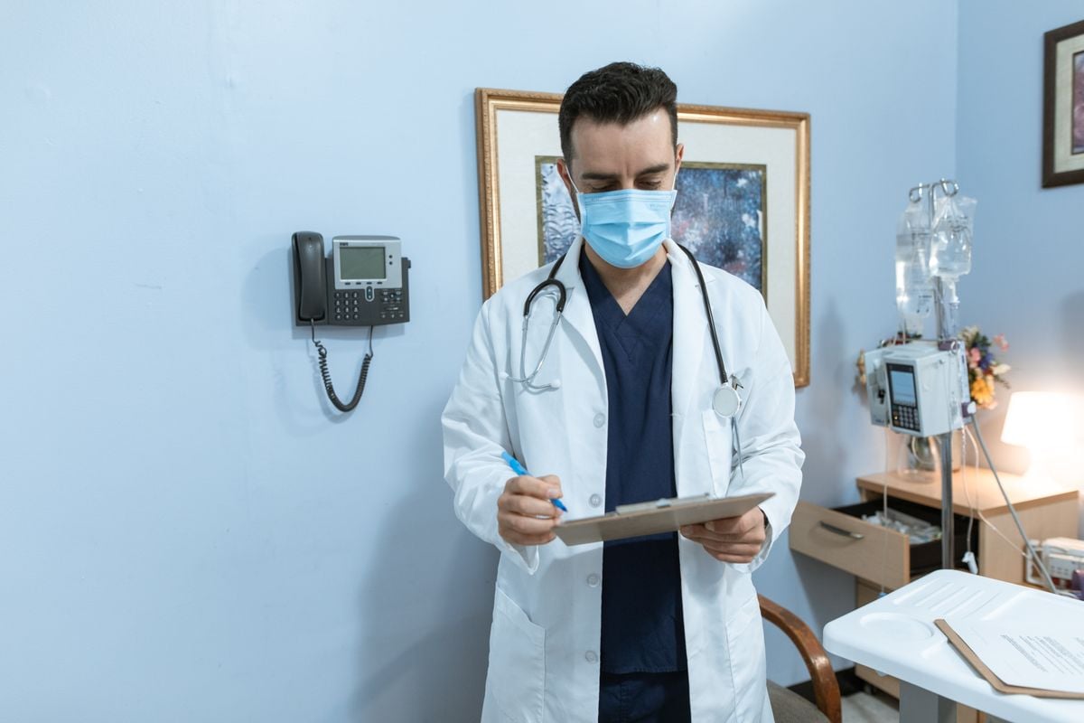 Healthcare professional consulting with a patient